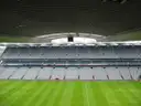 The pitch and stands of Croke Park seen from under the roof of a stand