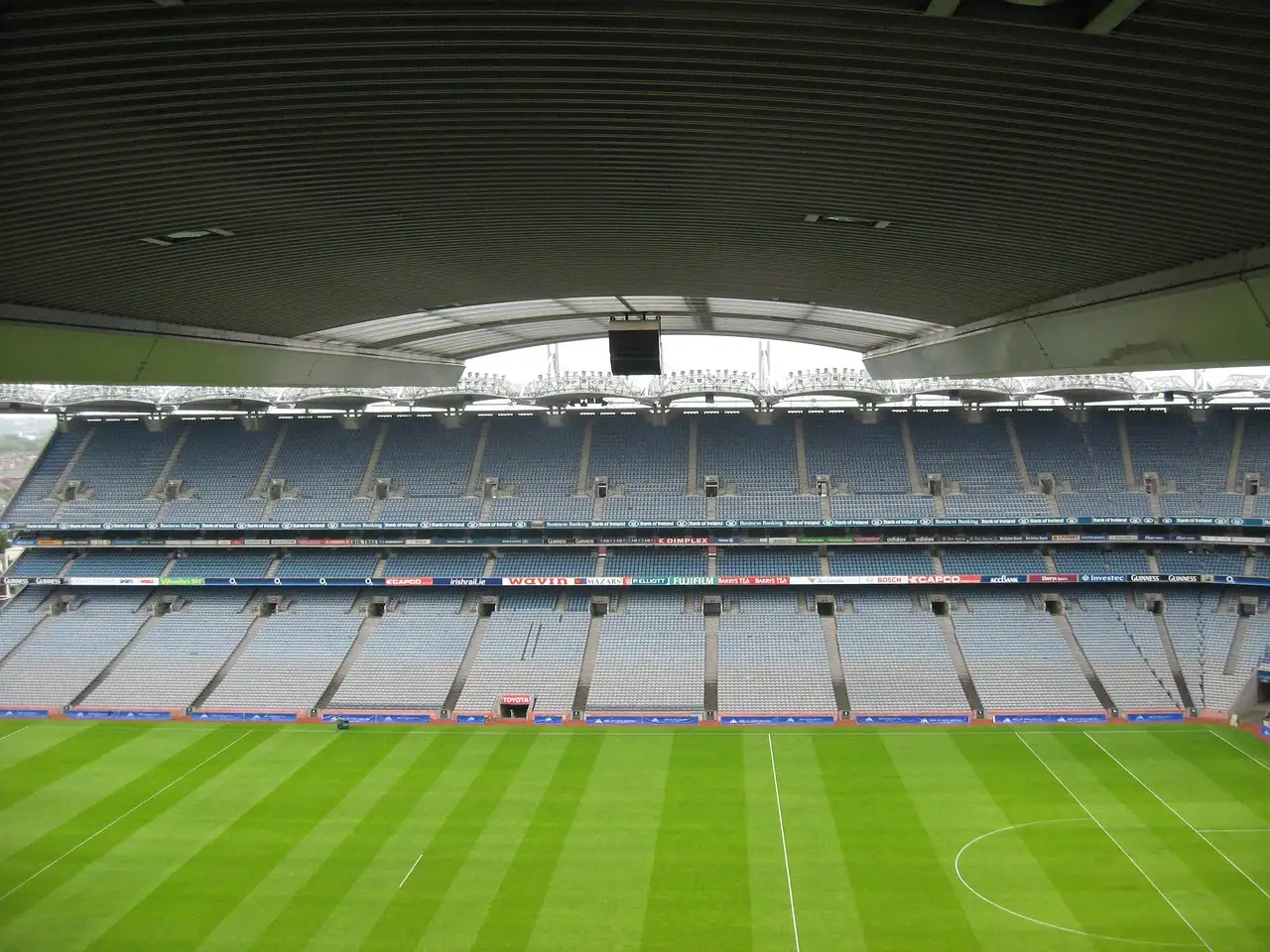 The pitch and stands of Croke Park seen from under the roof of a stand