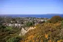 A view over the houses of south Dublin to Dublin Bay and Howth Head