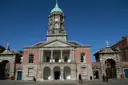 The red-brick Bedford Tower with its green dome above the cobbled Upper Yard of Dublin Castle