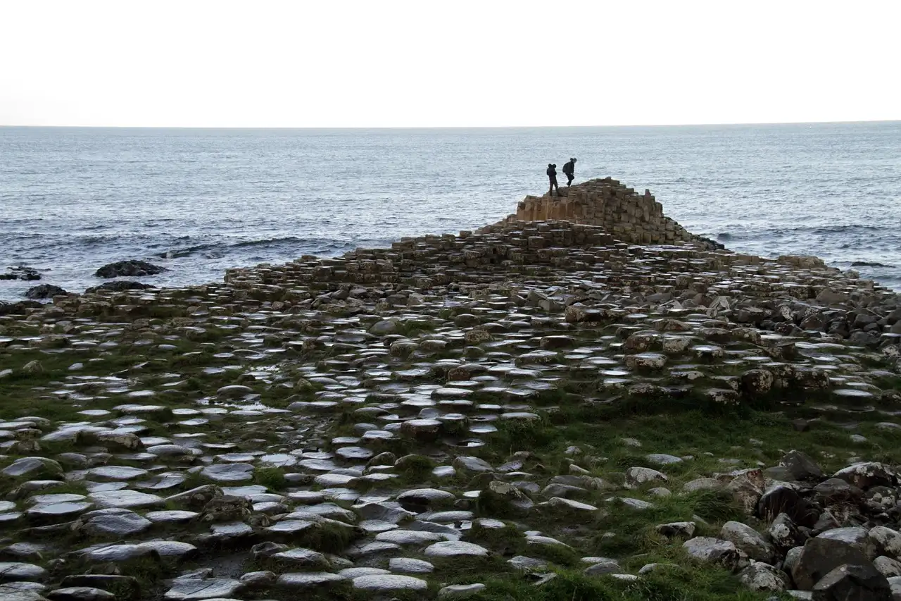 The stone columns of the Giant's Causeway running out to the sea