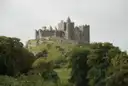 The Rock of Cashel, a ruined castle and church on a green hill