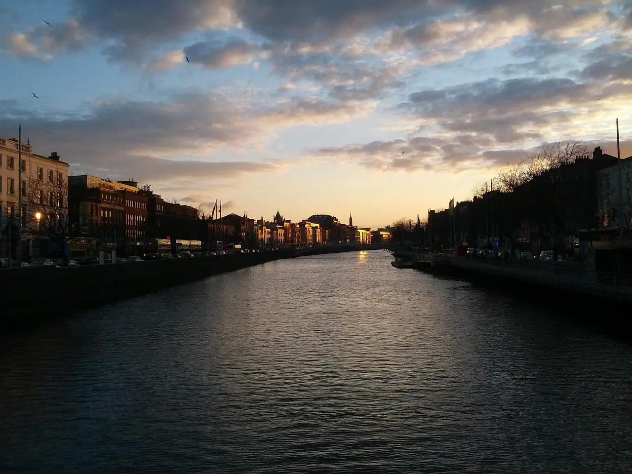 The River Liffey in Dublin at sunset, with the quays along both banks