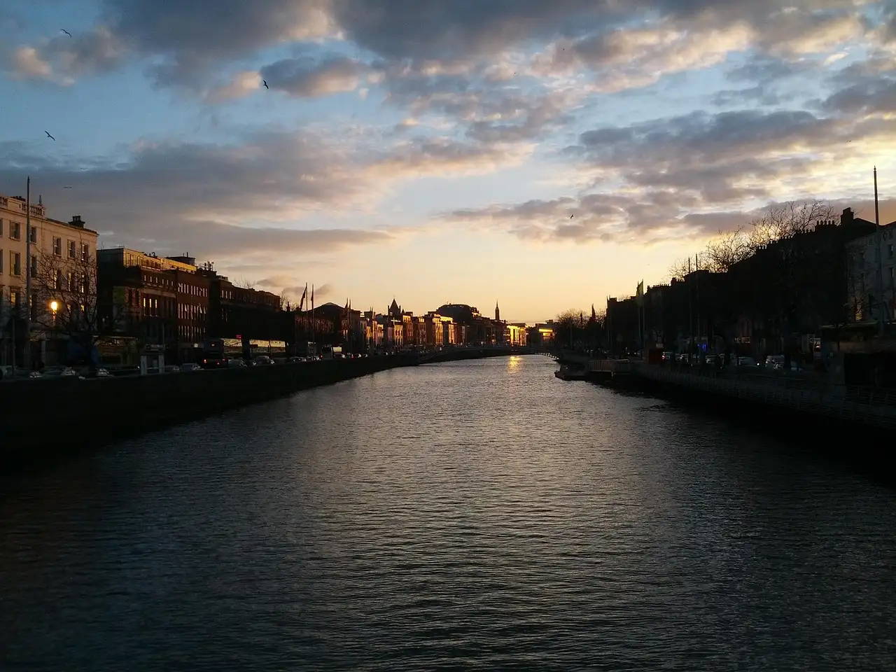 The River Liffey in Dublin at sunset, with the quays along both banks